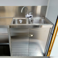 2 compartment water sink in the small food kiosk